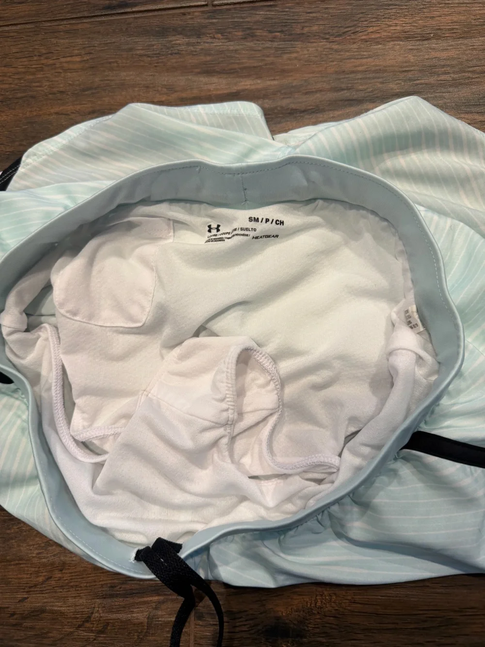 Under Armour Women's light blue Athletic Shorts with Black Trim, size S running